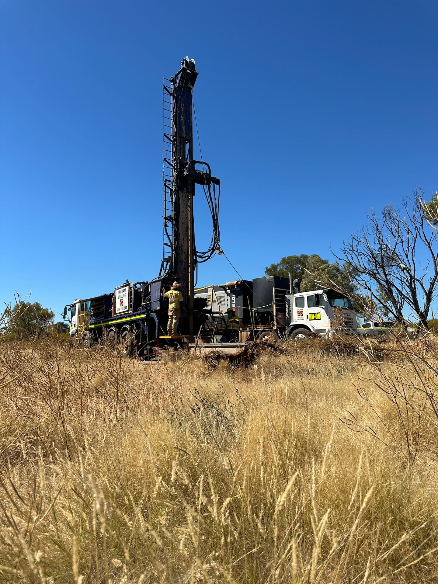 Rig drilling in spinifex grassland