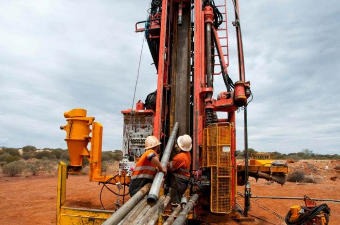 Big drilling machine is working on a contraction site to bore water holes